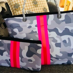 Neoprene boutique handbag and clutch